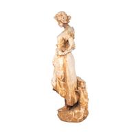 A French Terra Cotta Figure of a Farm Girl