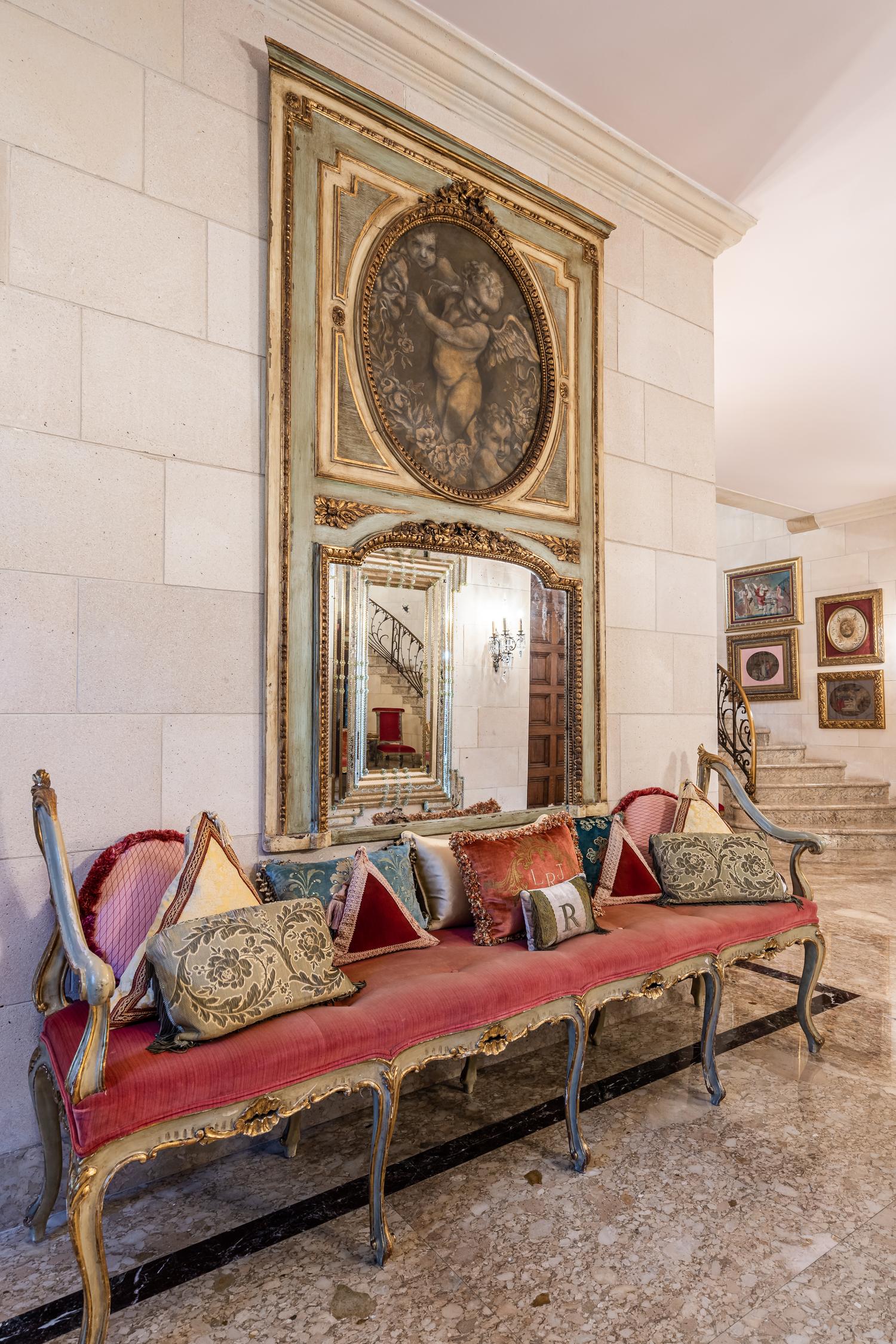 A Louis XV Style Painted and Parcel Gilt Hall Bench