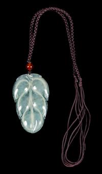 A Jadeite Leaf-Form Pendant Length 2 inches. — 20TH CENTURY