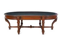 An Aesthetic Movement Leather Inset Carved Walnut Board Table