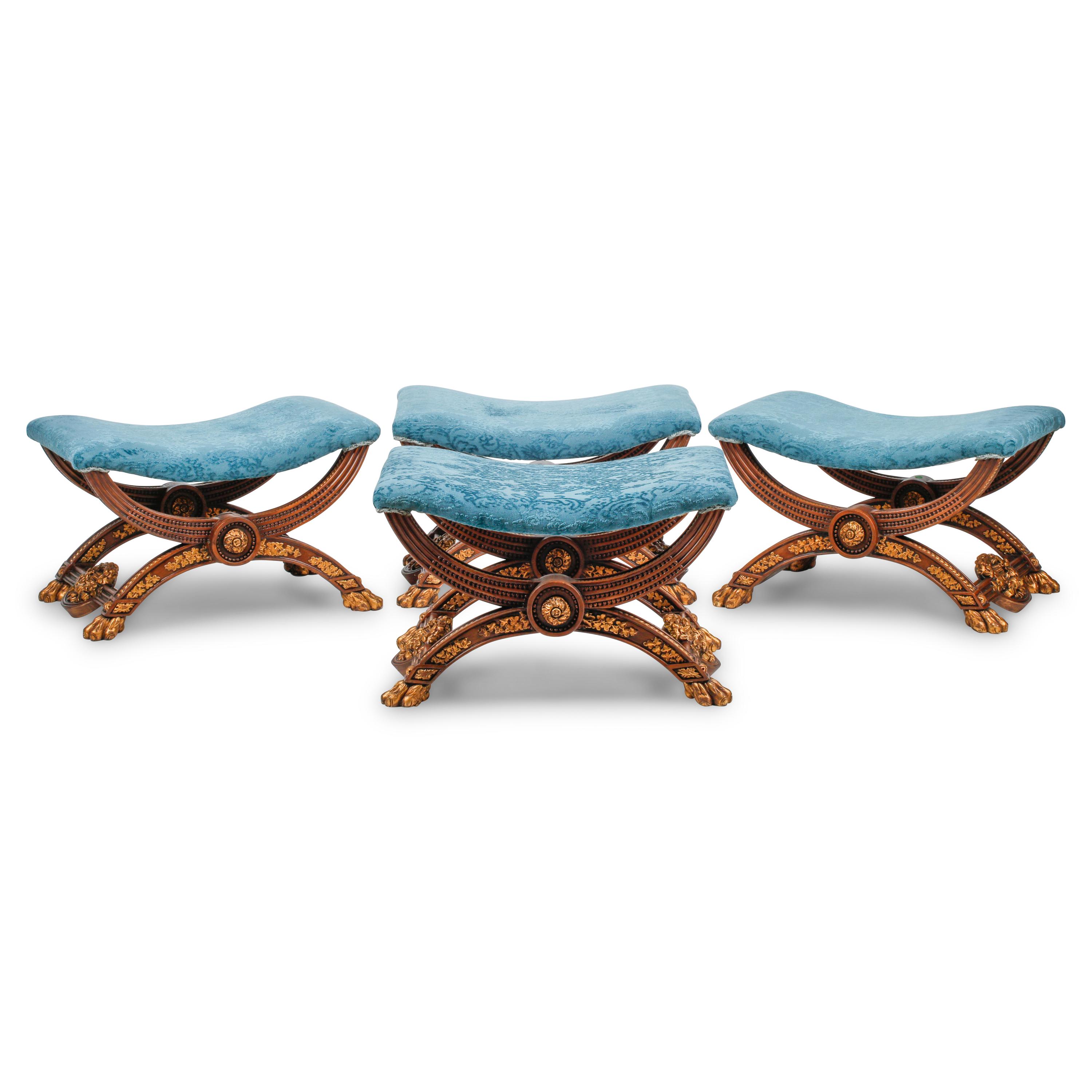A Set of Four Italian Neoclassical Style Carved and Parcel Gilt Walnut Benches
