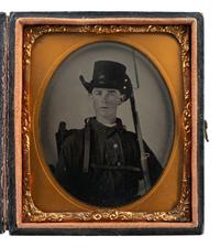 [CIVIL WAR]. Sixth plate tintype of armed soldier possibly representing North Carolina or Rhode Island.