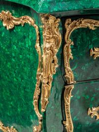 A Pair of Louis XV Style Gilt Bronze Mounted Malachite Commodes