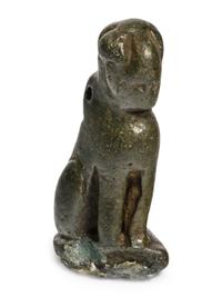 An Egyptian Bronze Sphinx