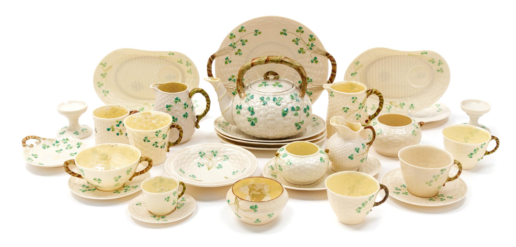 An Assembled Belleek Shamrock Basketweave Tea and Dessert Service Width of teapot 9 inches. — SECOND BLACK MARK THROUGH SEVENTH GOLD MARK (1891-1993)