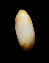A Chinese Russet and White Jade Pebble-Form Snuff Bottle