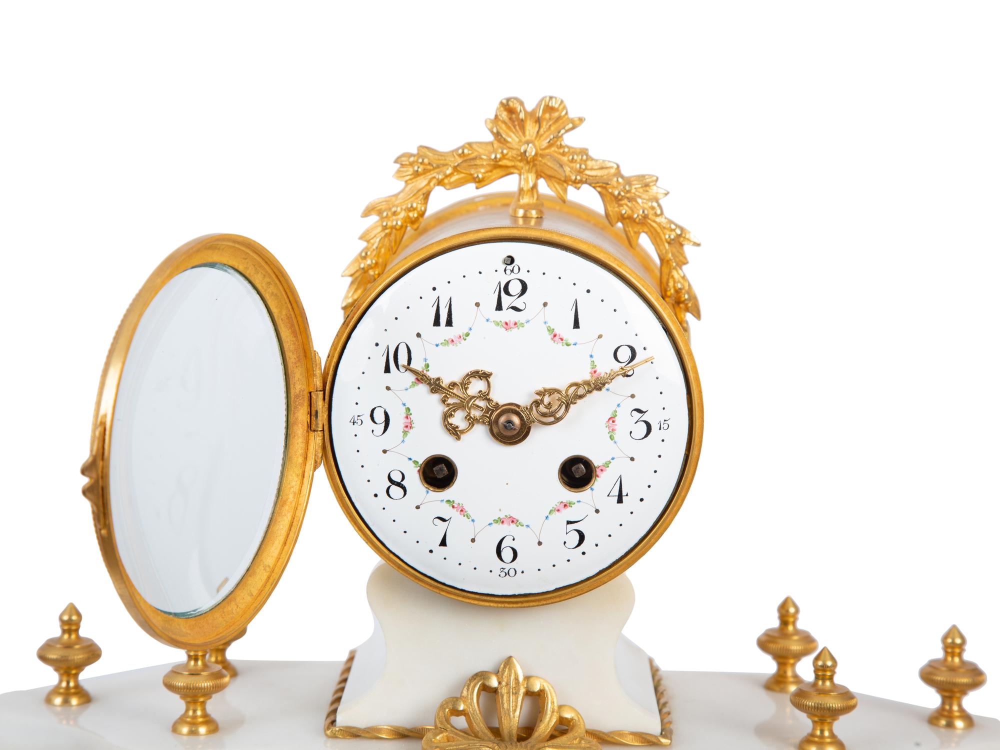 A French Gilt Bronze and White Marble Clock Garniture — 20TH CENTURY