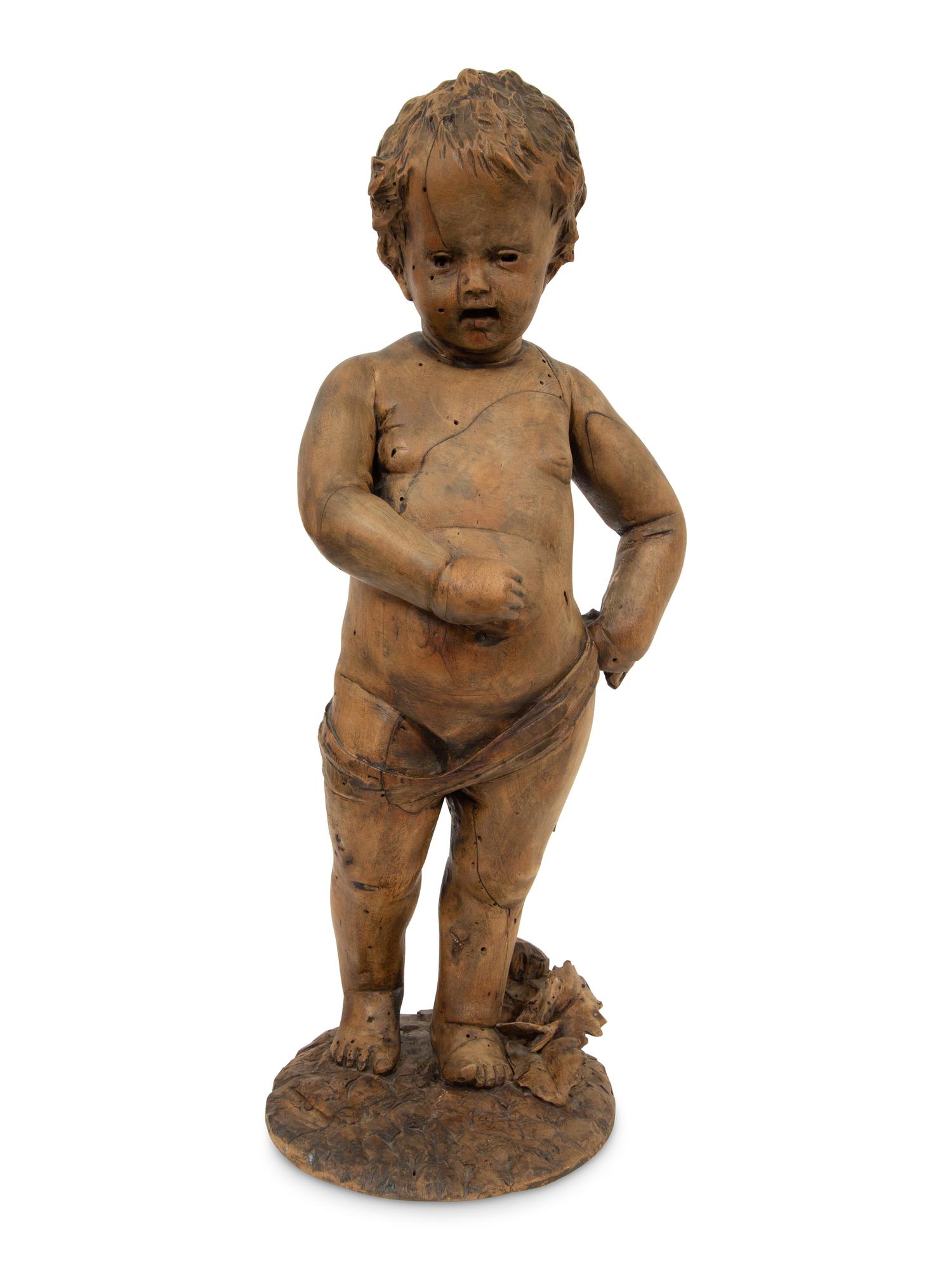 A Flemish Carved Wood Putto