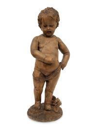 A Flemish Carved Wood Putto