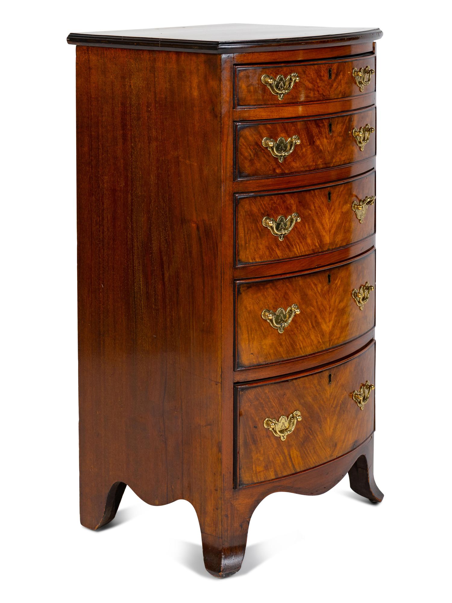 A Georgian Style Bow Front Diminutive Chest