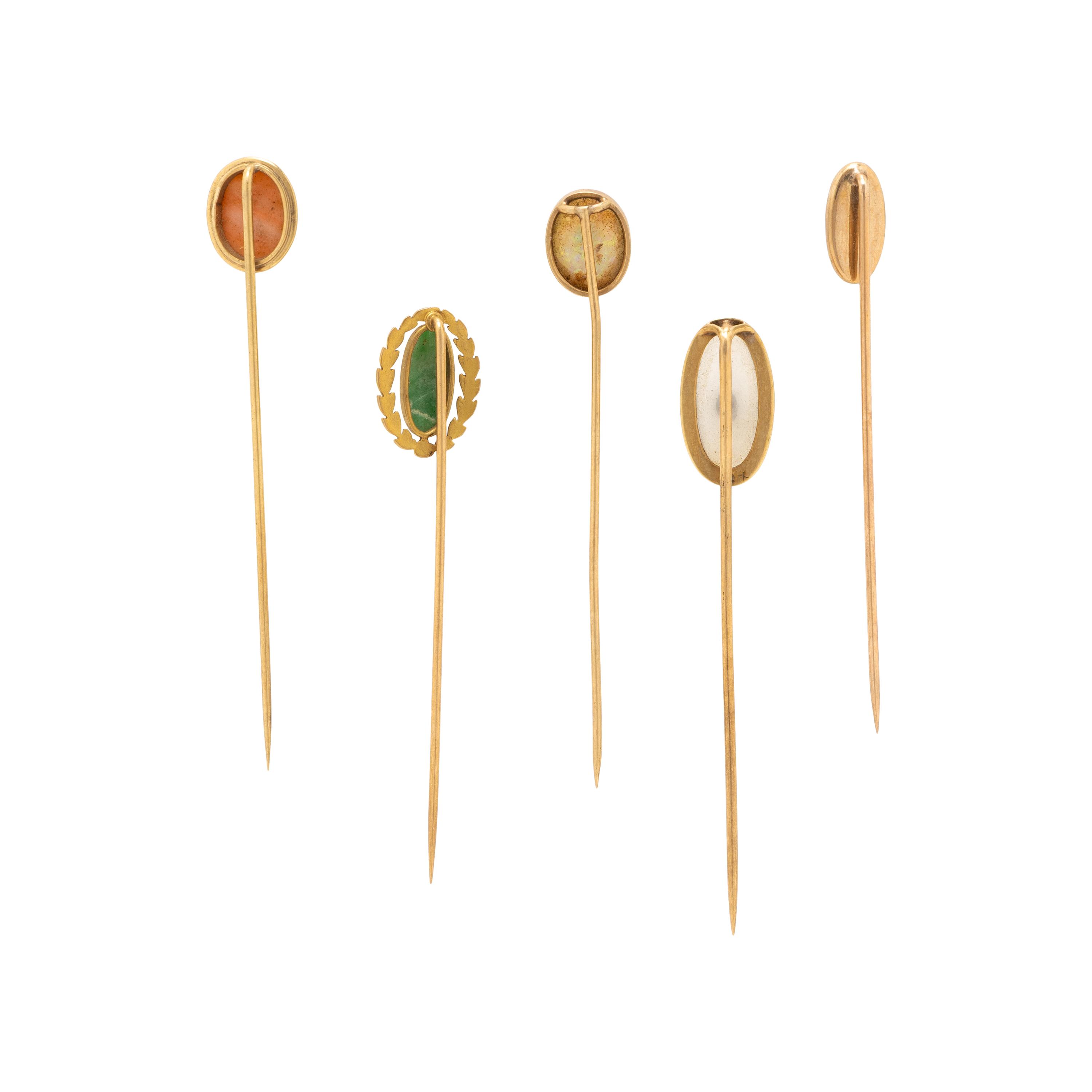 COLLECTION OF GOLD AND GEMSTONE STICK PINS