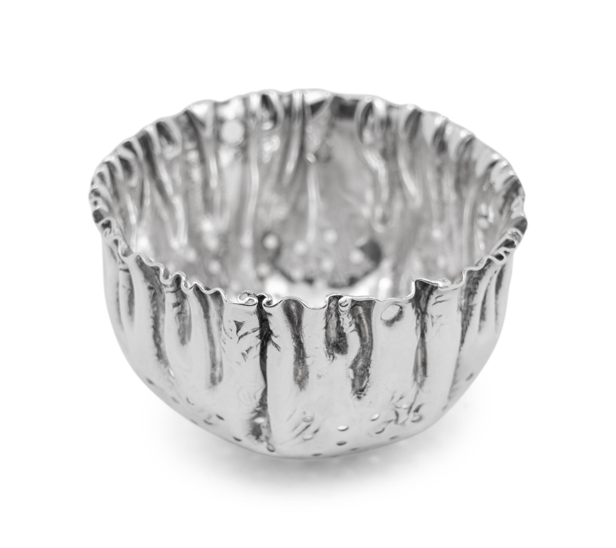A Continental Silver Tea Caddy, Strainer and Tea Ball