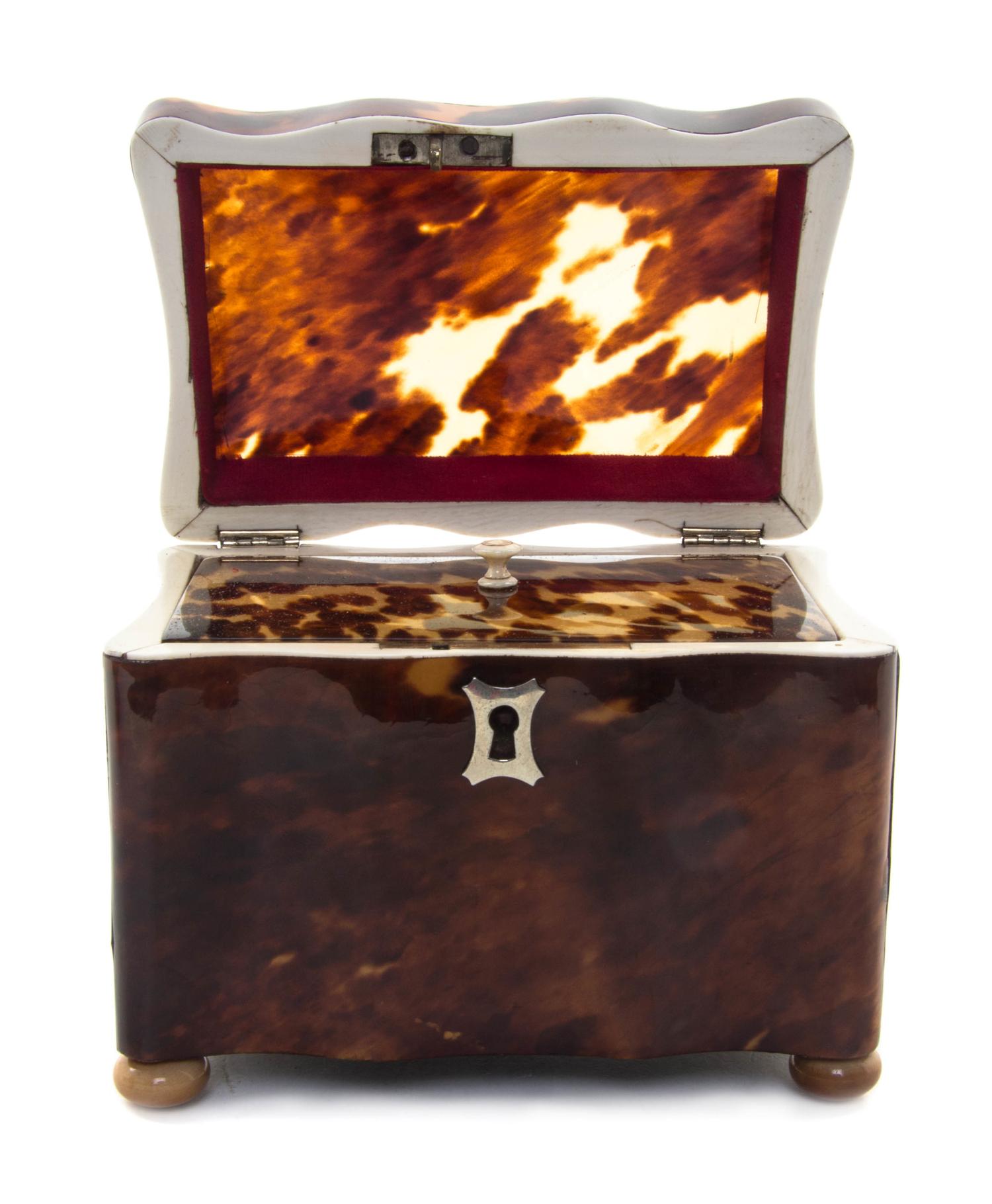 An English Tortoise Shell Tea Caddy, Height 3 3/4 x width 4 1/2 x depth 3 inches.