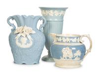 Seven Jasperware Pitchers and Table Articles