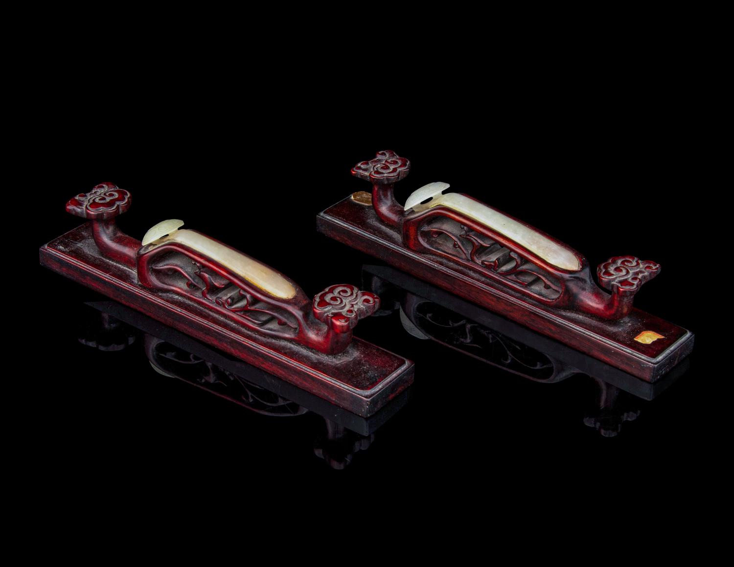 A Pair of Jade Inset Hardwood Paper Weights