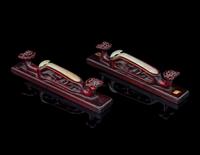 A Pair of Jade Inset Hardwood Paper Weights
