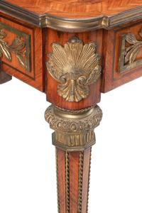 A Louis XVI Style Marquetry Center Table