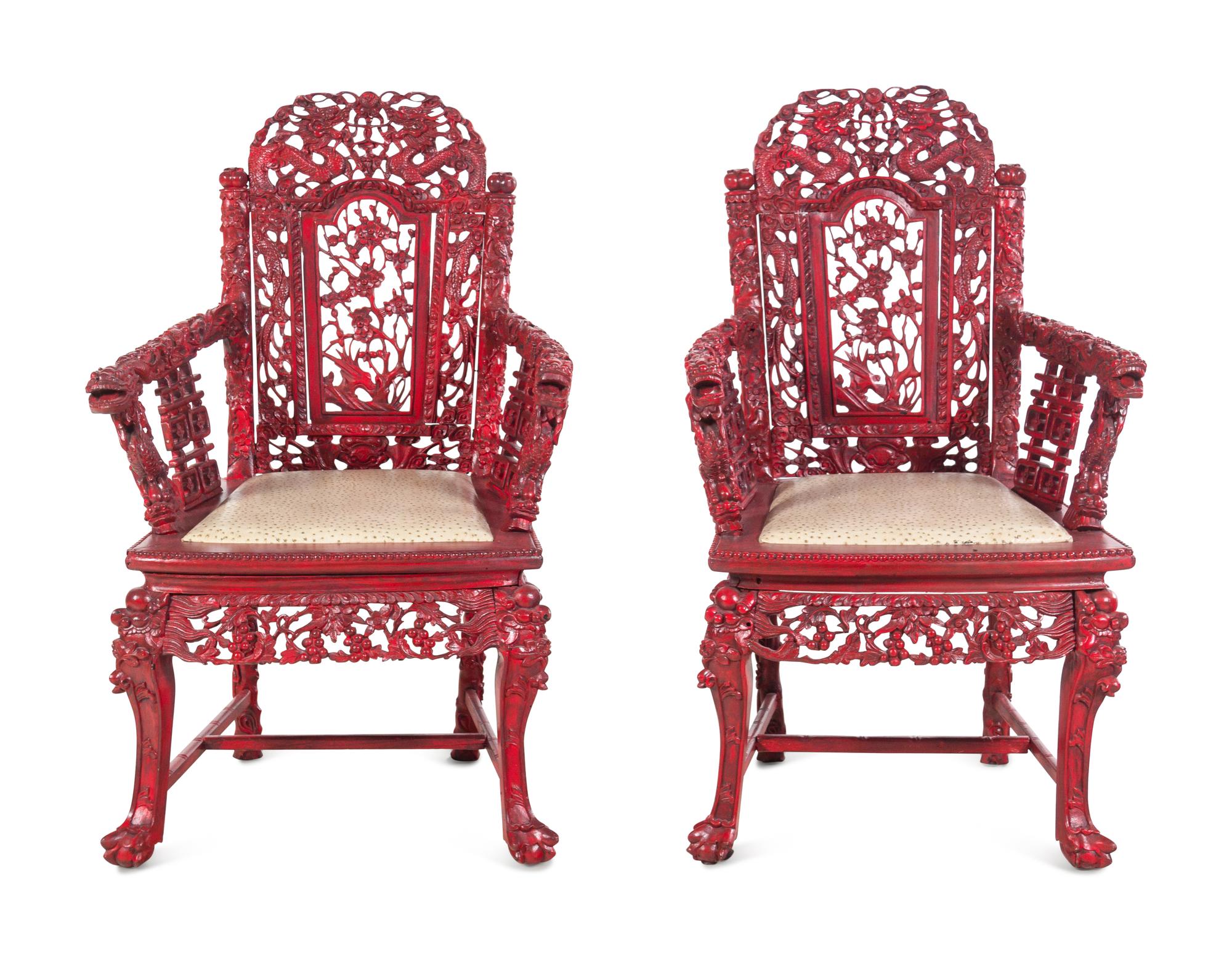 A Pair of Chinese Carved and Painted Wood Chairs