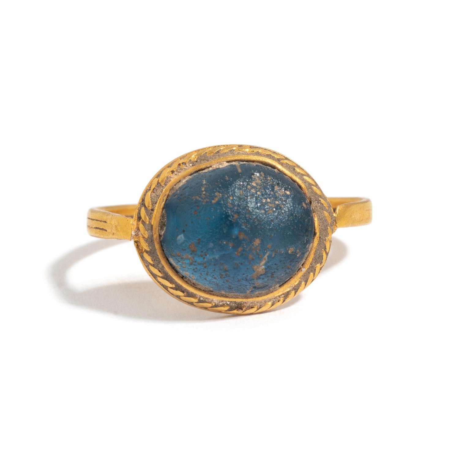 A Merovingian Gold and Blue Glass Finger Ring
