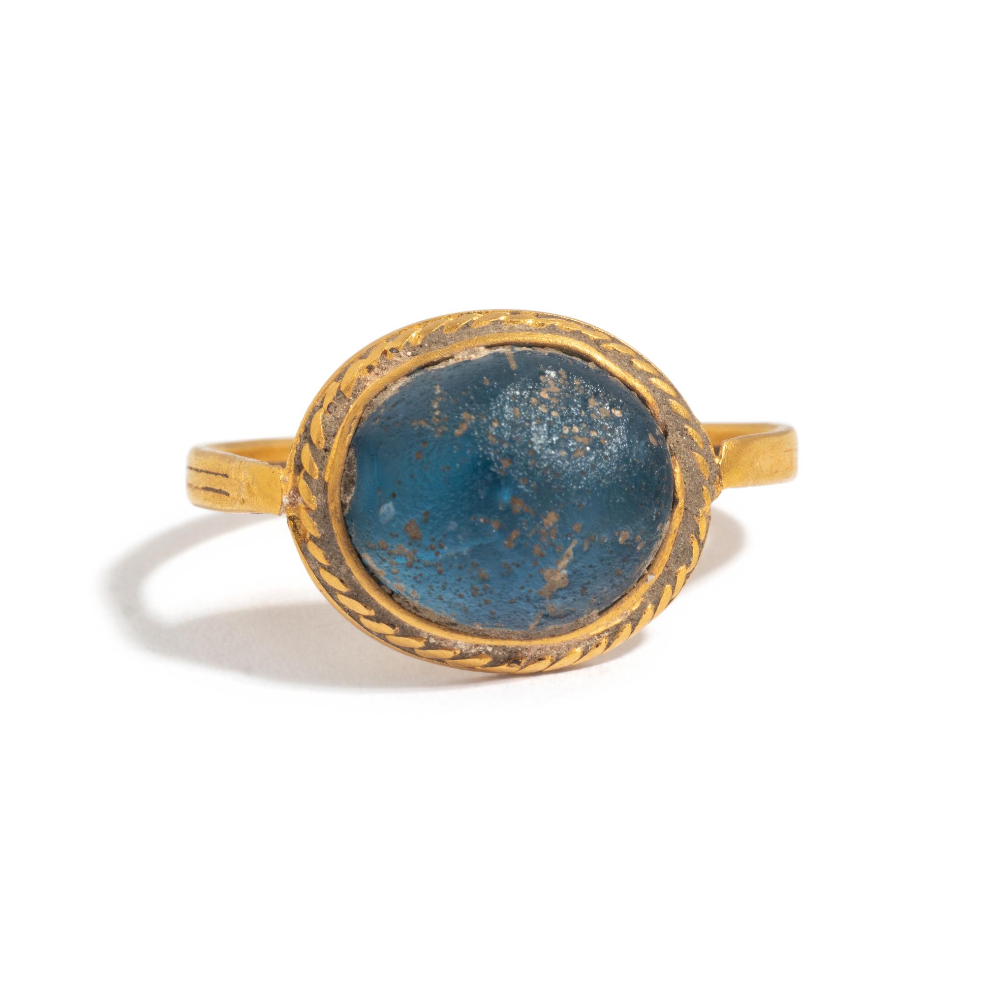 A Merovingian Gold and Blue Glass Finger Ring