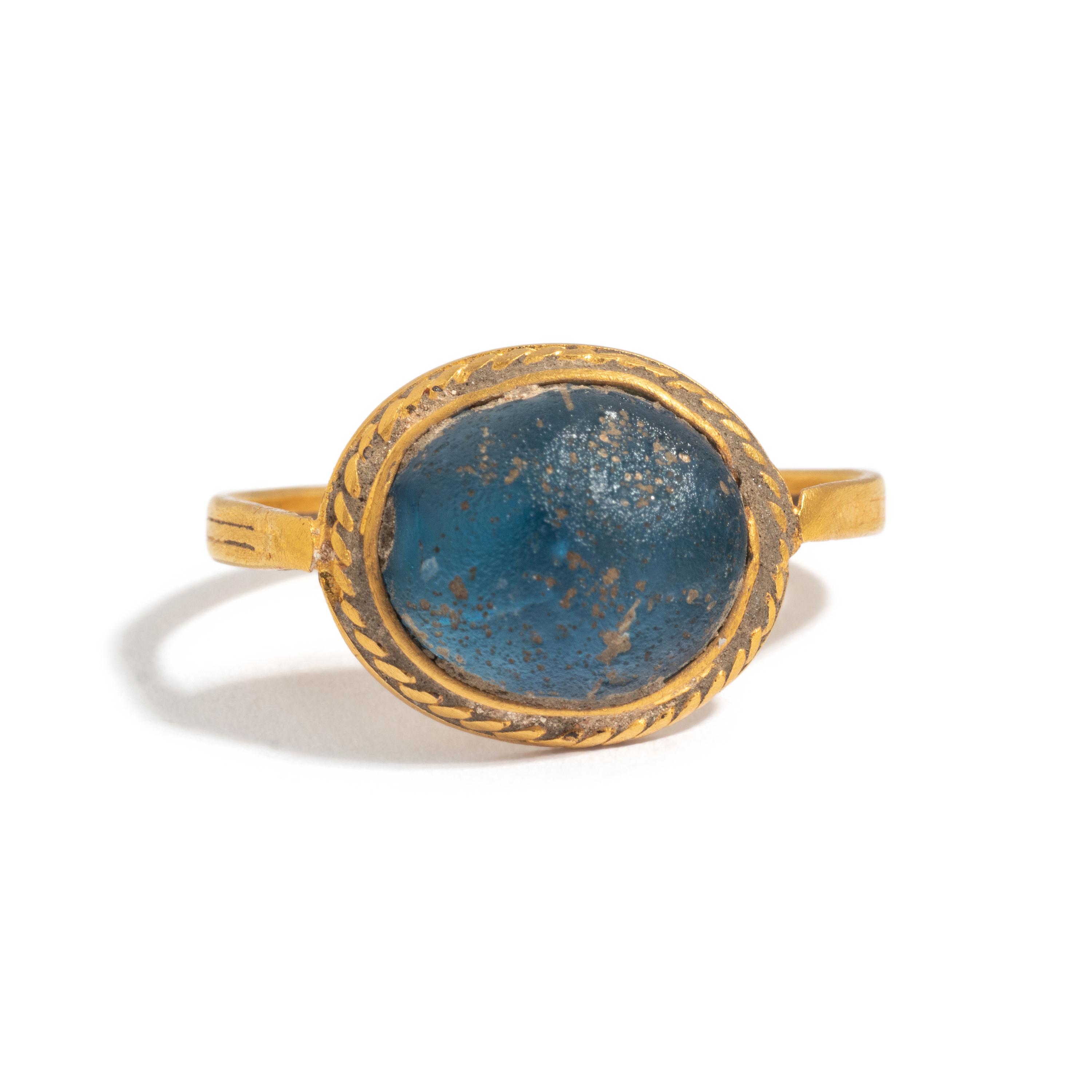 A Merovingian Gold and Blue Glass Finger Ring