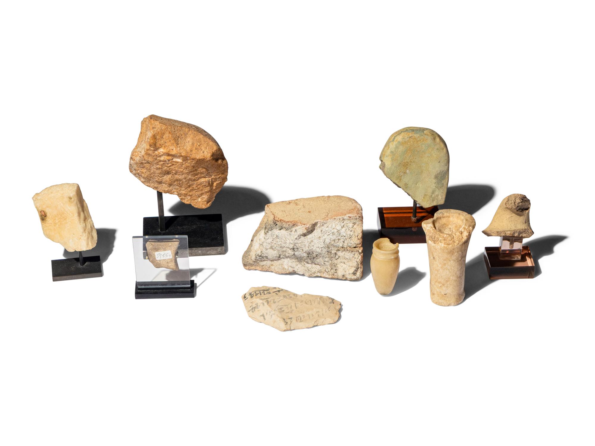 Nine Egyptian Stone Vessels and Fragments with Hieroglyphs and Script