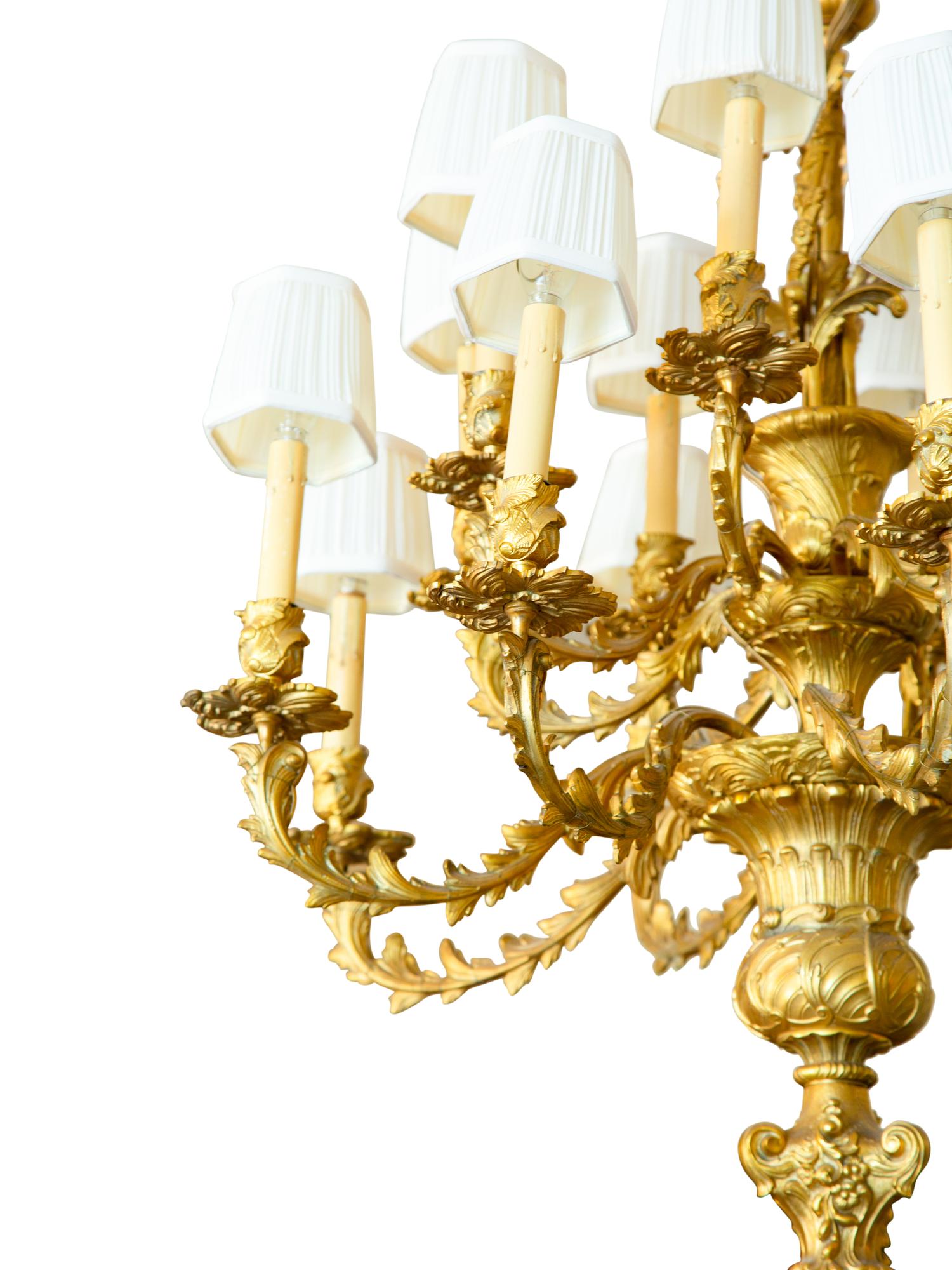 A Louis XV Style Gilt Bronze Sixteen-Light Chandelier