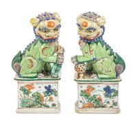 A Pair of Famille Verte Porcelain Figures of Fu Lions
