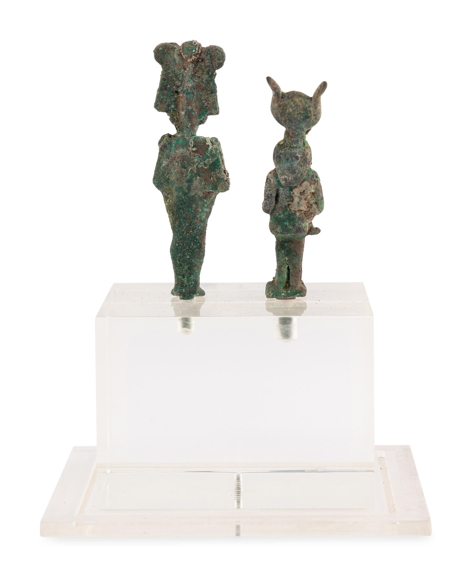 An Egyptian Bronze Osiris and Isis nursing Harpocrates