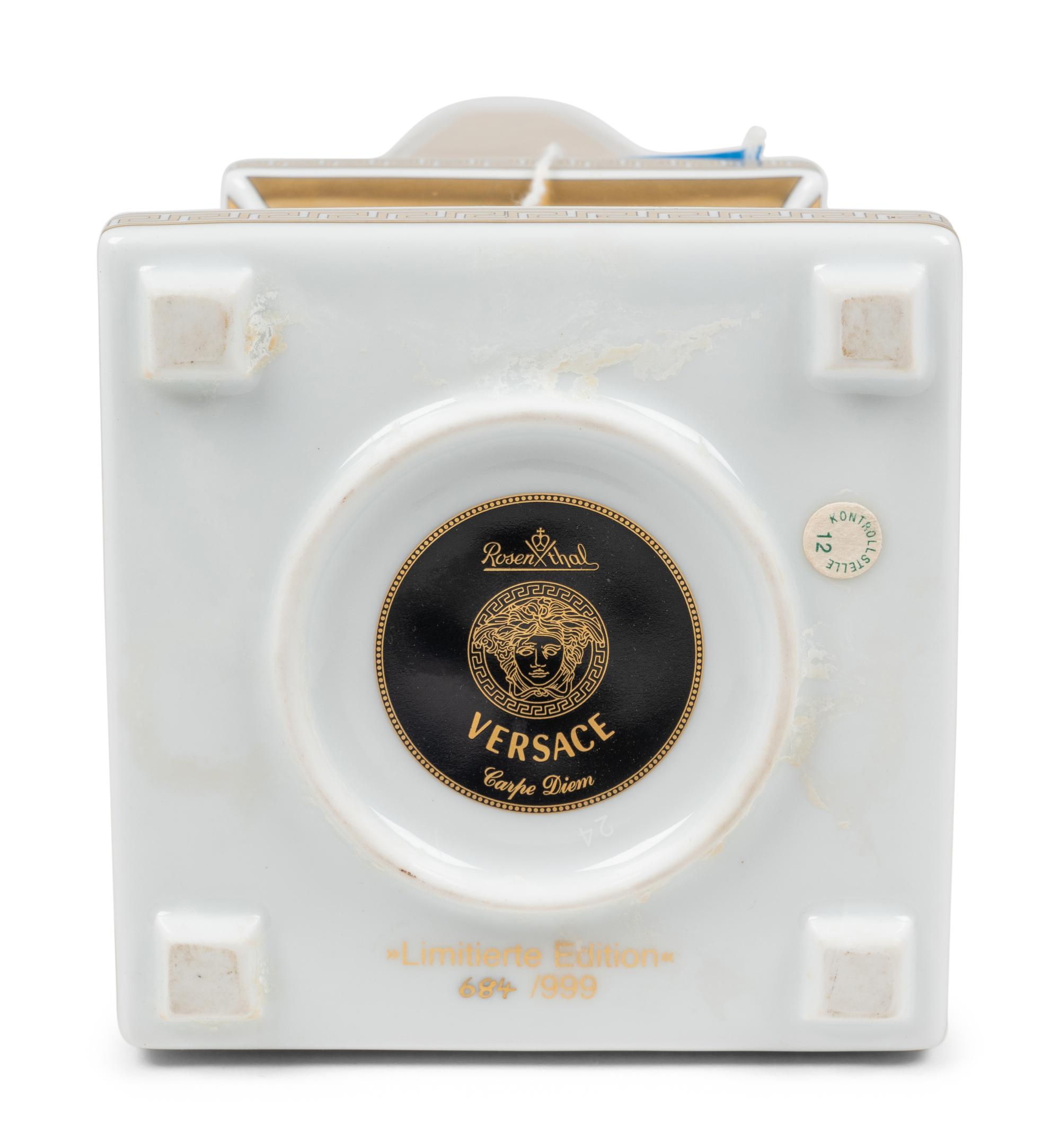A Versace Carpe Diem Clock-Inset Porcelain Obelisk