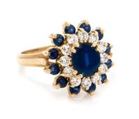 An 18 Karat Yellow Gold, Sapphire and Diamond Ring, 4.80 dwts.