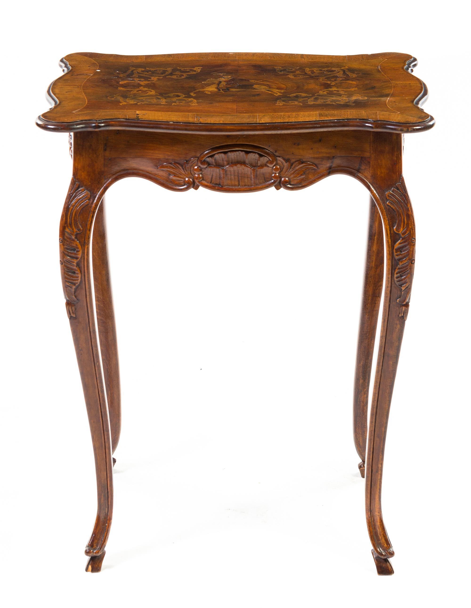 A French Marquetry Occasional Table, Height 29 1/2 x width 23 1/4 x depth 16 3/4 inches.