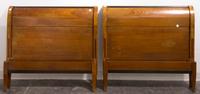 A Pair of Biedermeier Twin Bed Frames Height of headboard 36 x width 39 3/4 inches.