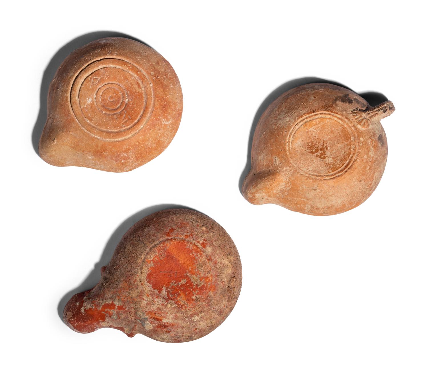 Three Roman Terracotta Oil Lamps