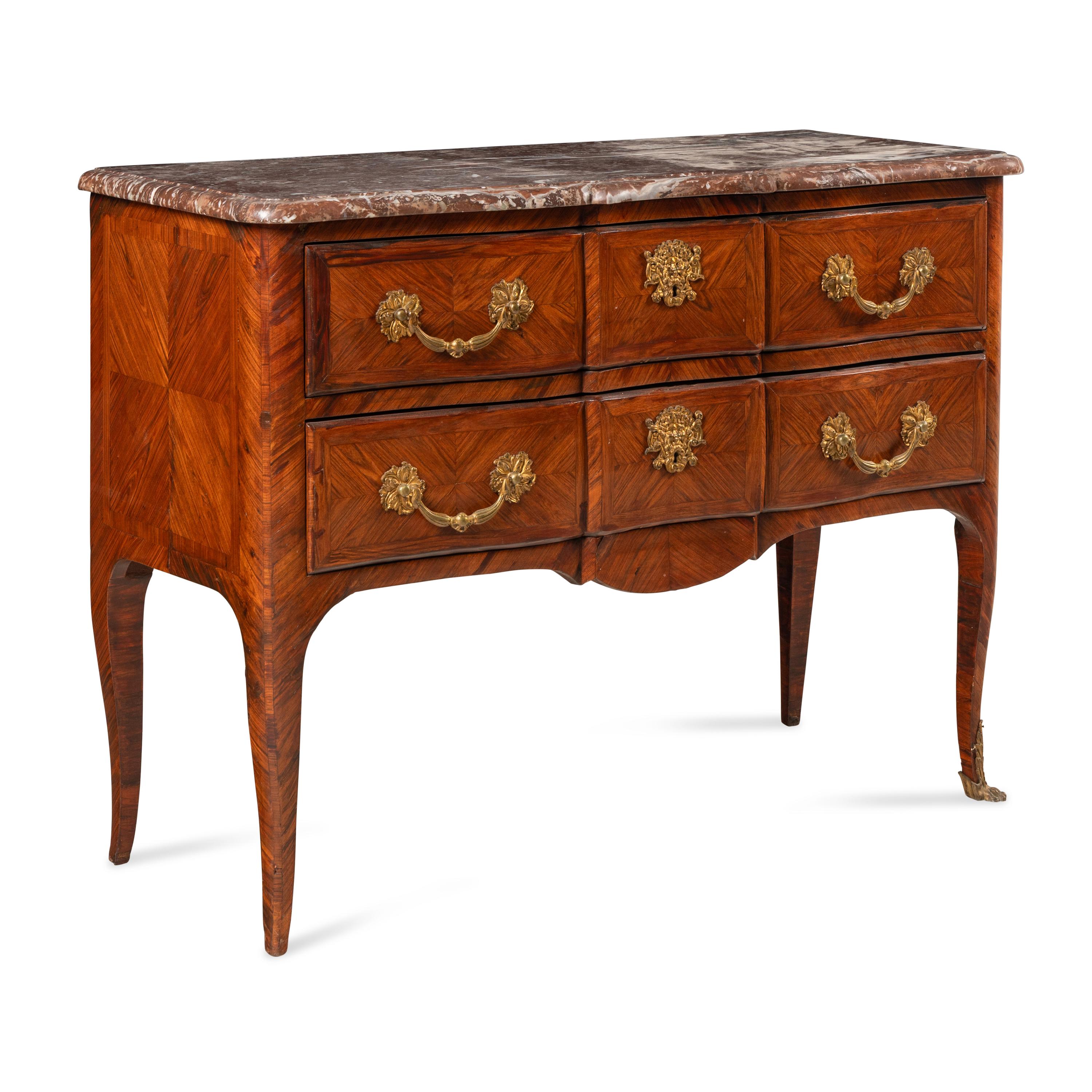 A Régence Style Gilt Bronze Mounted Tulipwood Parquetry Marble-Top Commode