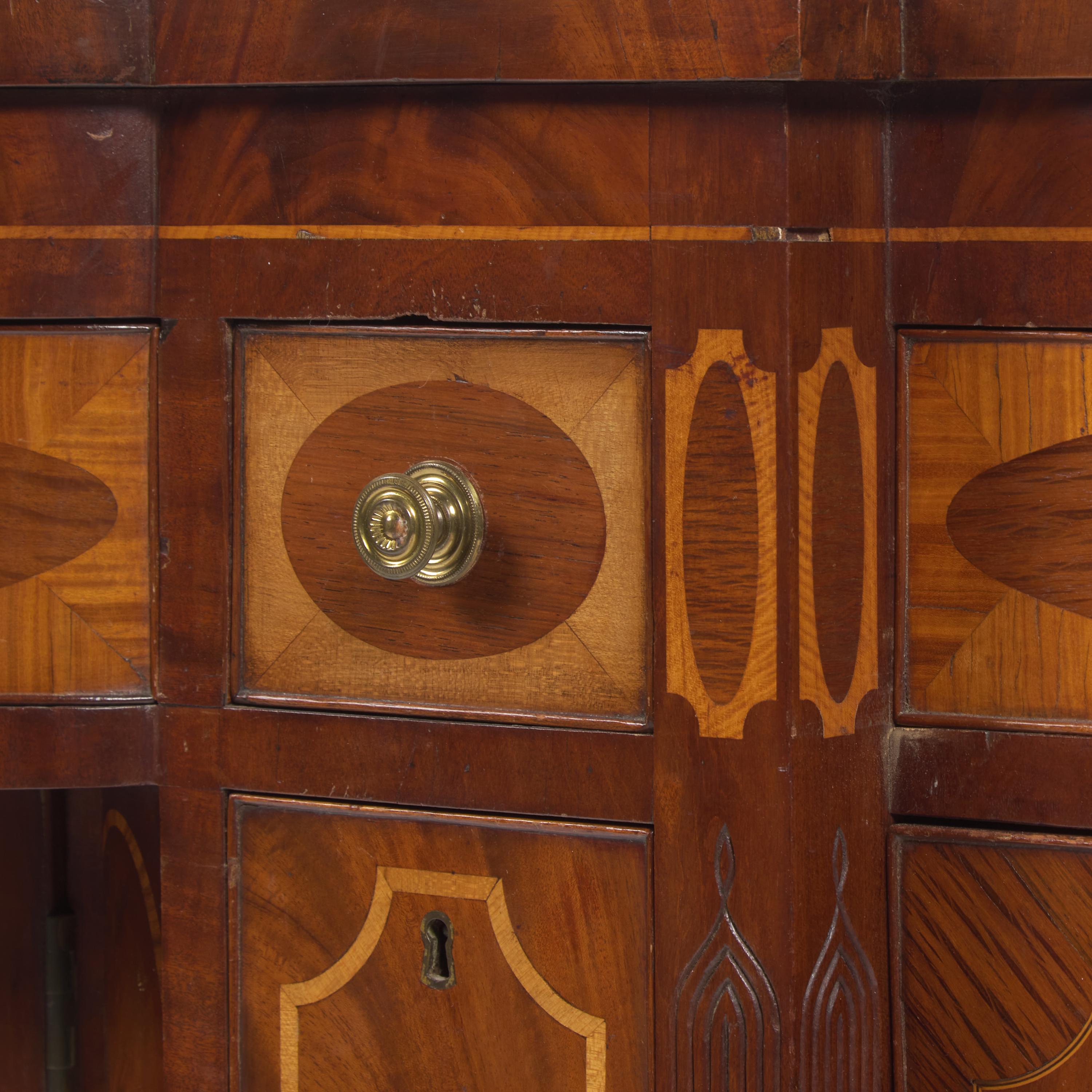 A Federal Inlaid, Figured and Carved Mahogany Sideboard