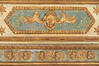 An Italian Neoclassical Painted and Parcel Gilt Mirror