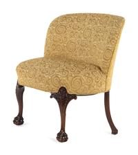 An Oversized George II Style Carved Walnut Slipper Chair
