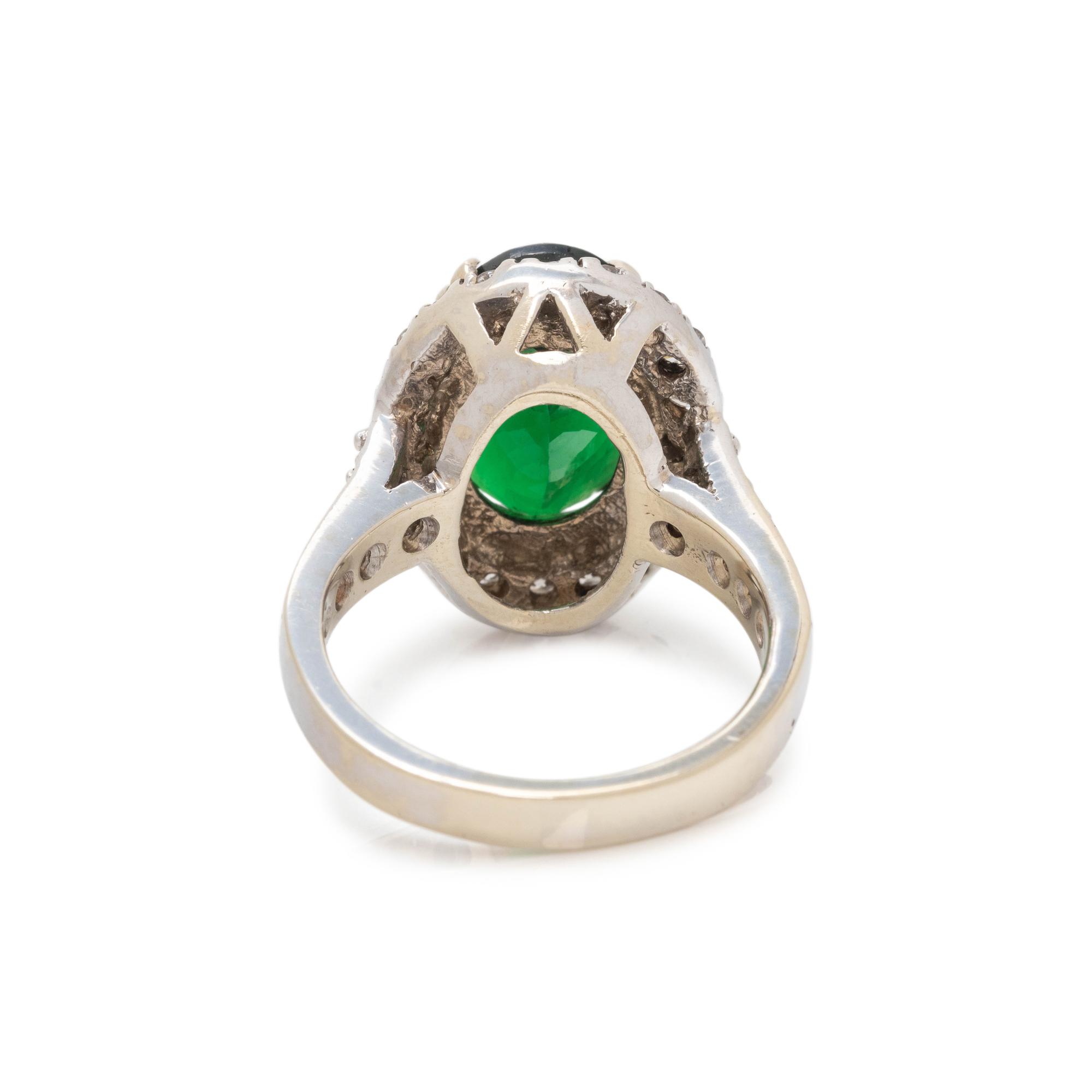 TSAVORITE GARNET AND DIAMOND RING