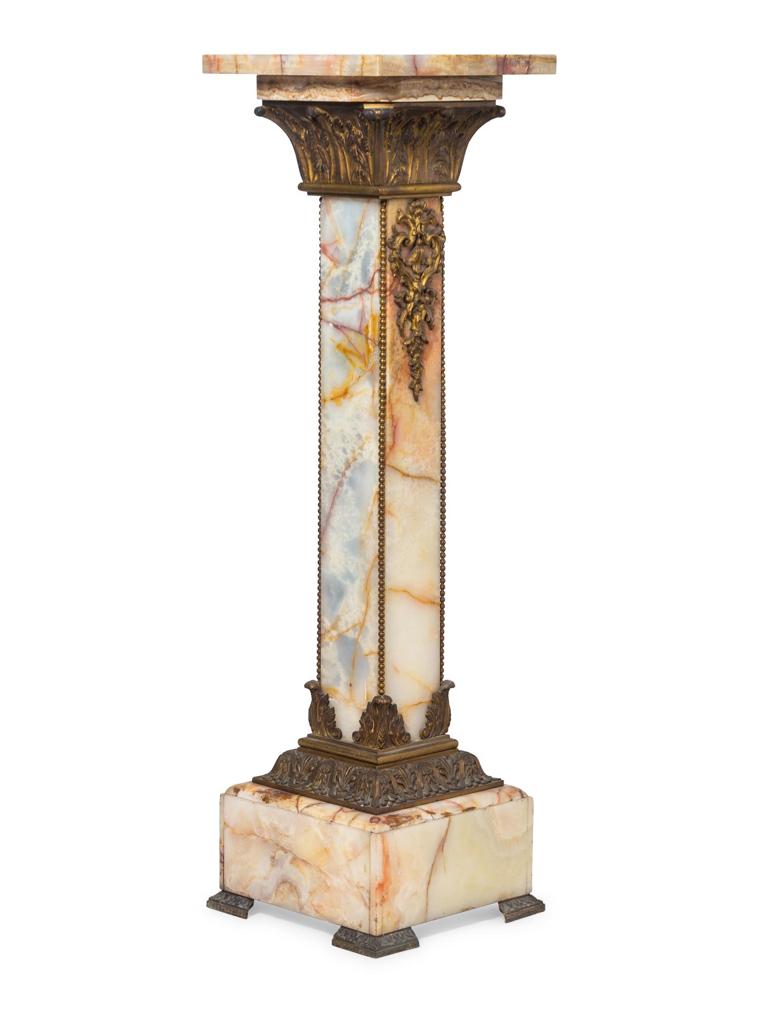 A Neoclassical Gilt Bronze Mounted Onyx Pedestal