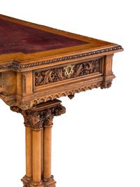 An Austrian Carved Oak Writing Table