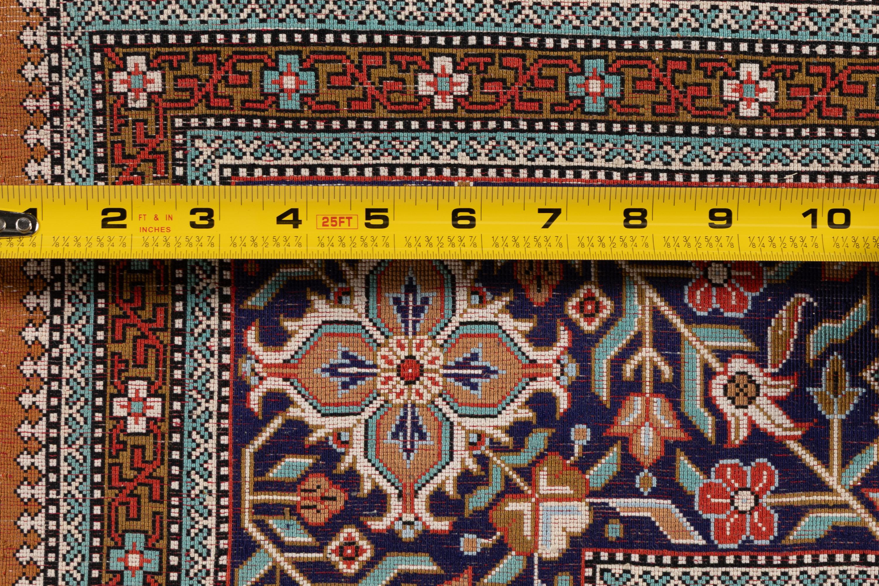 An Indian or Qom Silk Rug