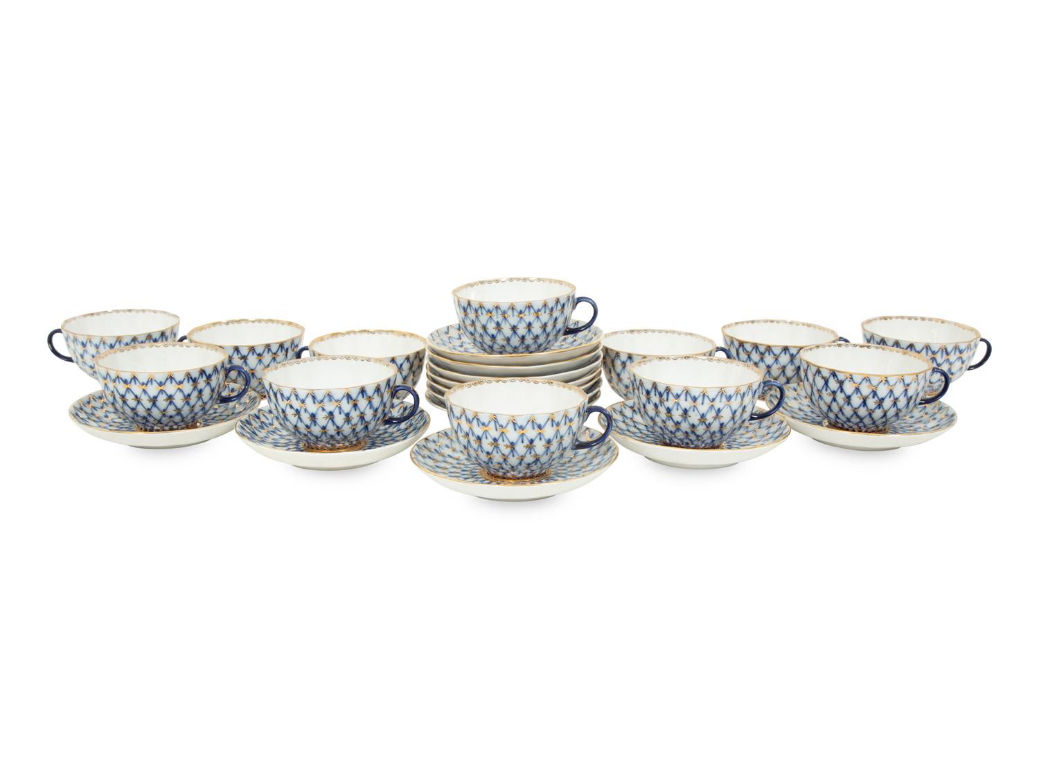 A Set of Twelve Lomonosov Cobalt Net Porcelain Teacups and Saucers