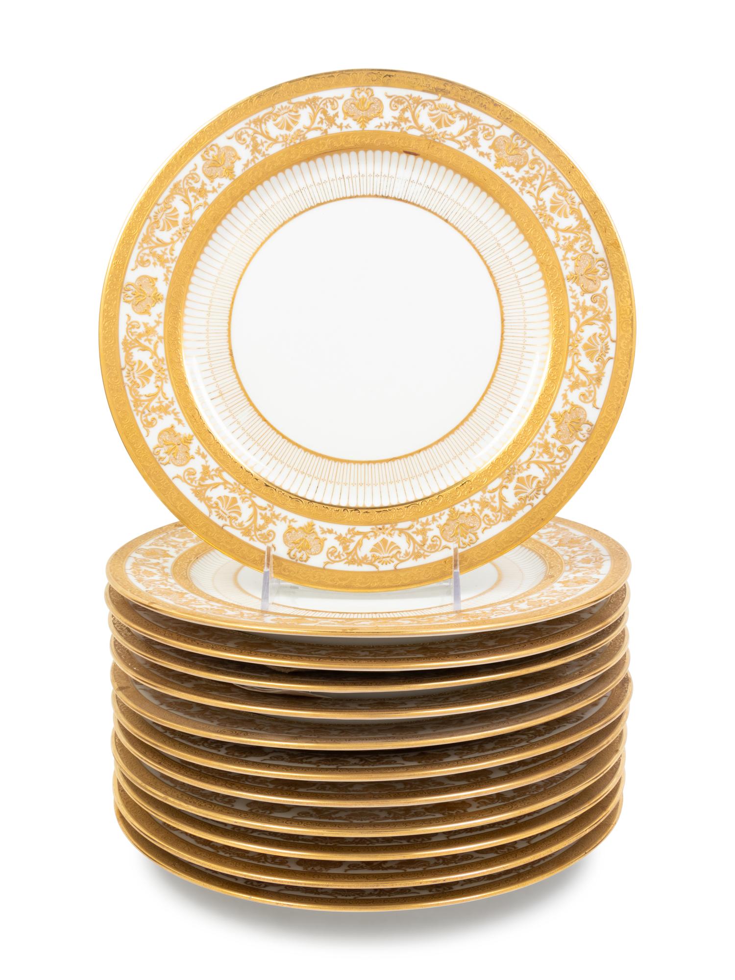 A Set of Twelve Limoges Service Plates
