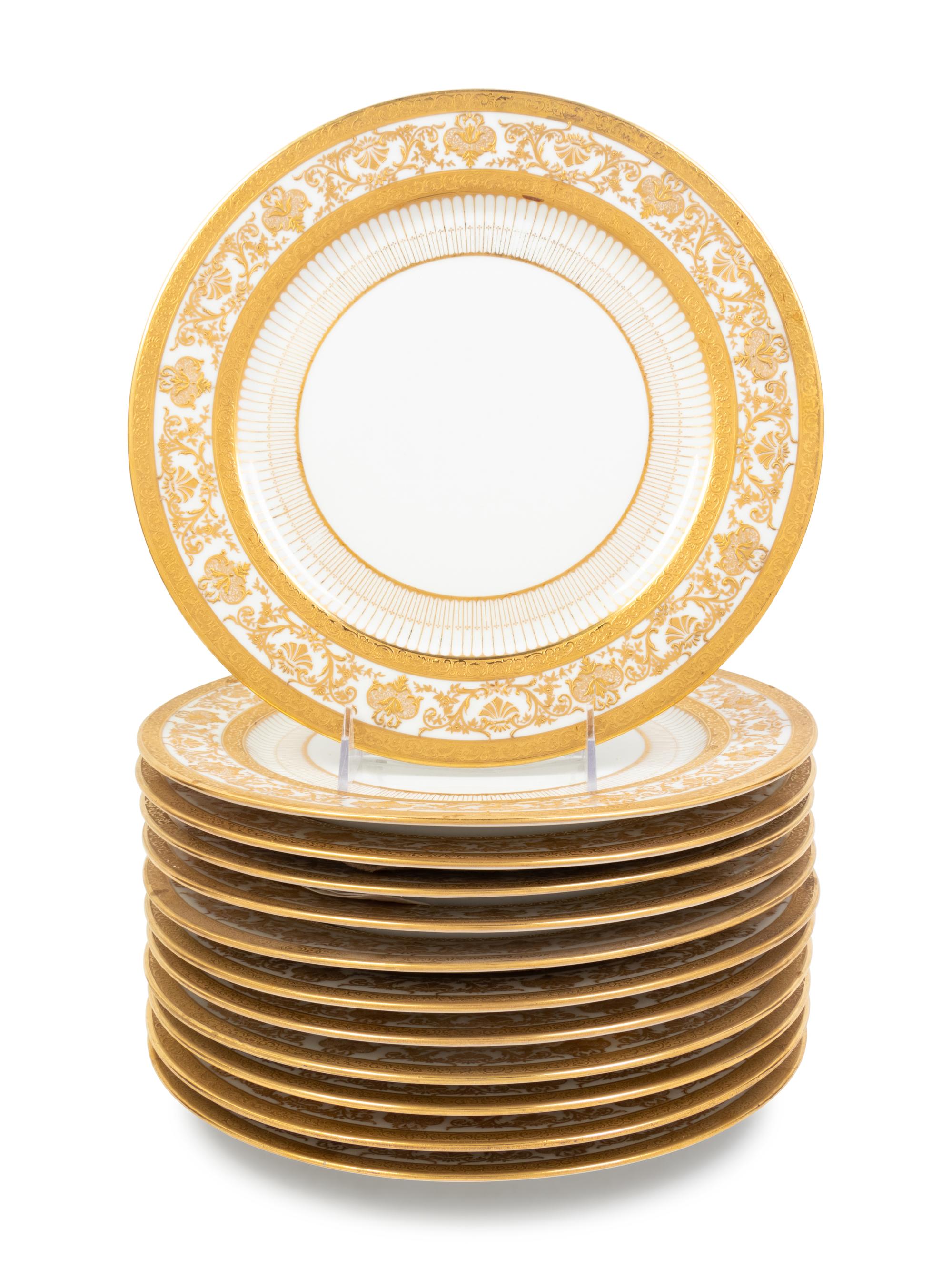 A Set of Twelve Limoges Service Plates