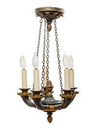An Empire Style Gilt and Patinated Bronze Five-Light Chandelier