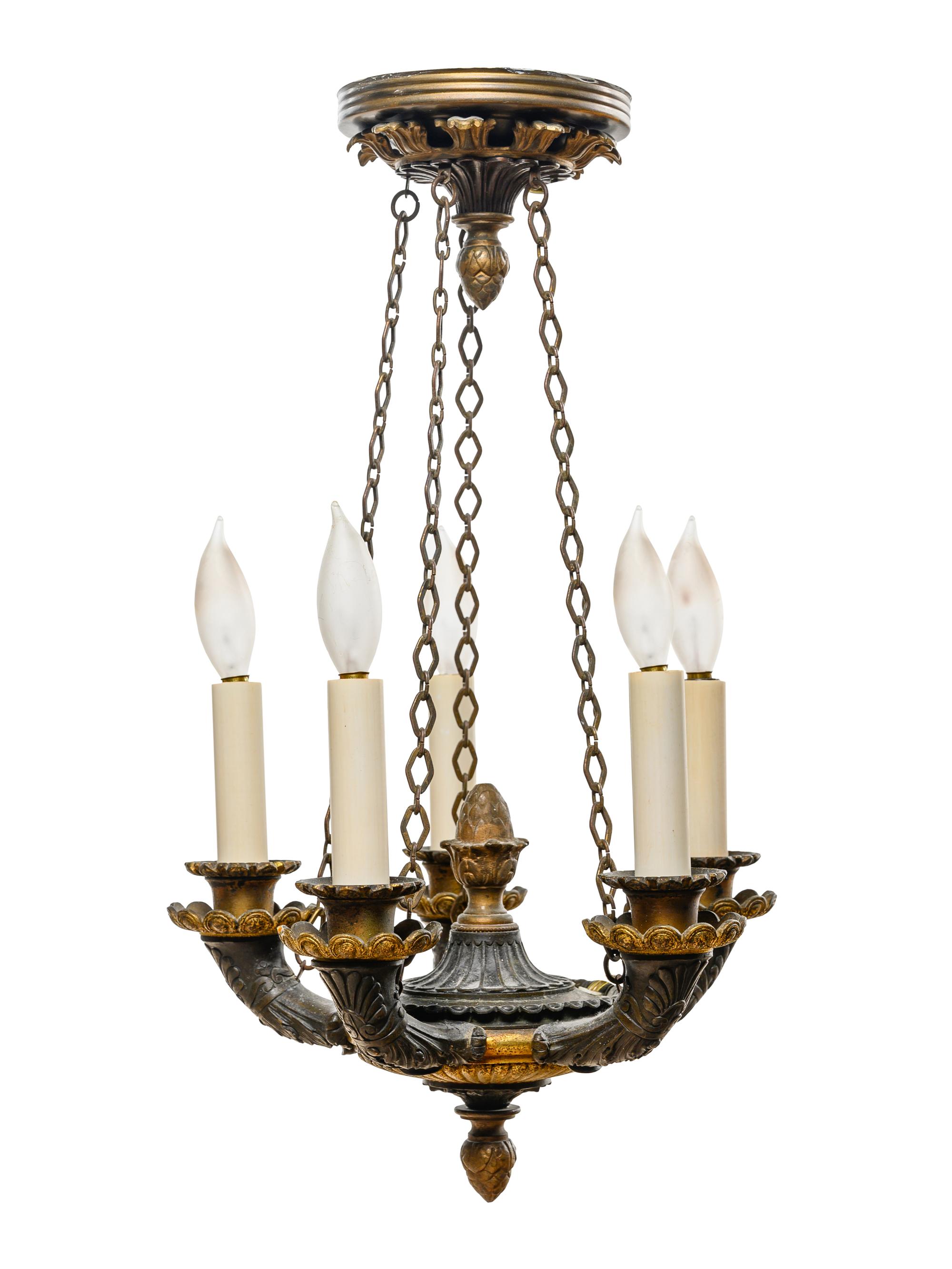 An Empire Style Gilt and Patinated Bronze Five-Light Chandelier