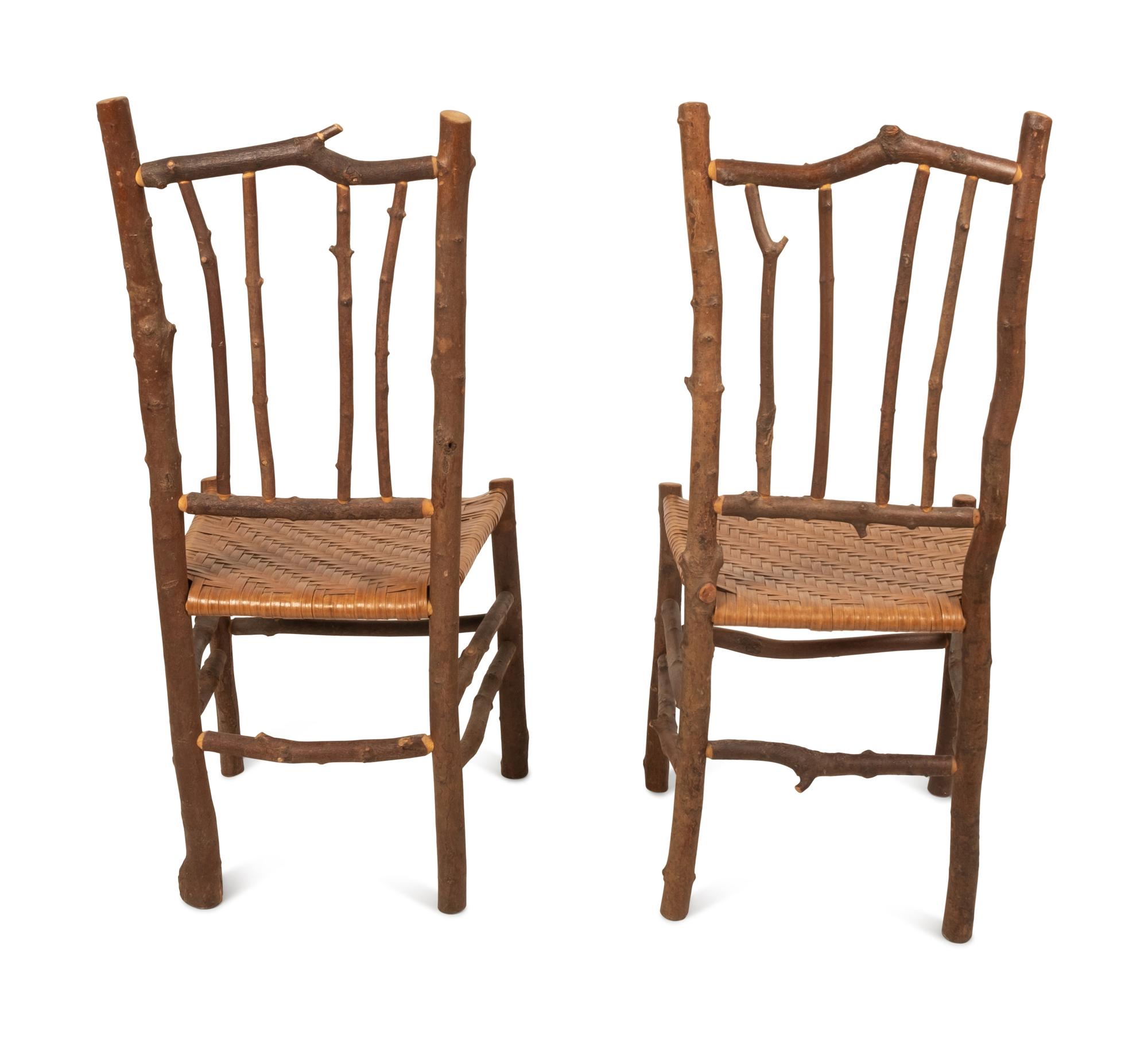 A Pair of Old Hickory Style Side Chairs with Reed Seats