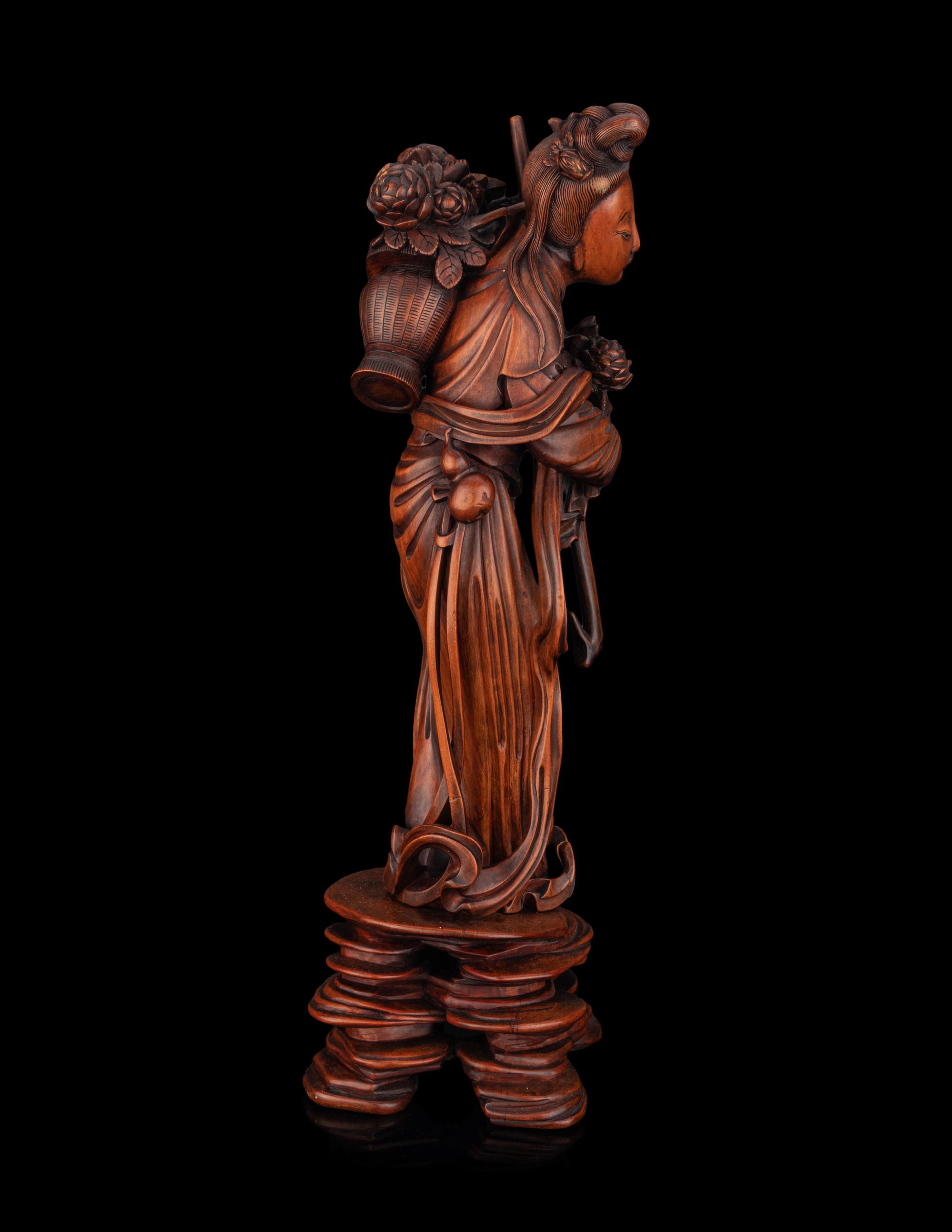 A Chinese Boxwood Figure of a Female Immortal