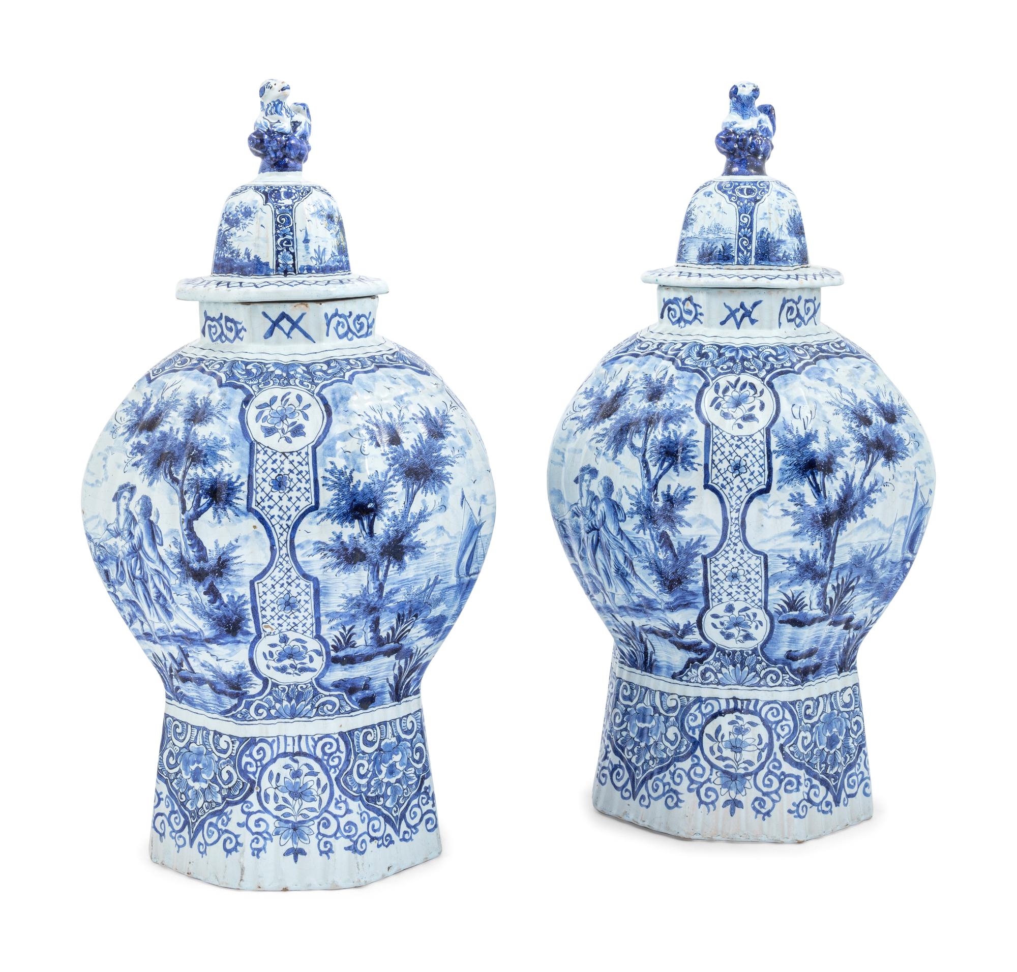 A Pair of Large Delftware Vases and Covers